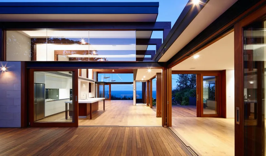 Open-plan living opening to a coastal view, Bronte
